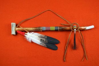 Rawhide wrapped Peace pipe