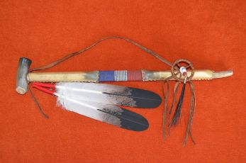 Rawhide wrapped Peace pipe
