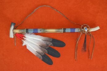 Rawhide wrapped Peace pipe